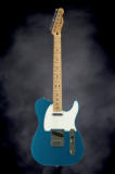 Fender MIM Standard Telecaster. Simple, no frills, great sounding guitar.